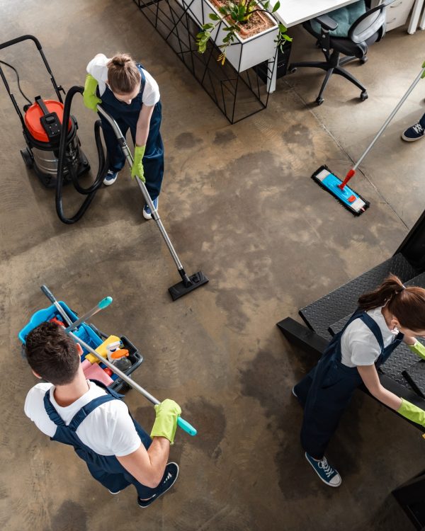 top view of cleaning company team cleaning modern office
